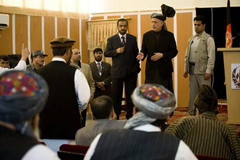 Afghan President Hamid Karzai talks during a meeting with elders in Kunduz, Afghanistan.